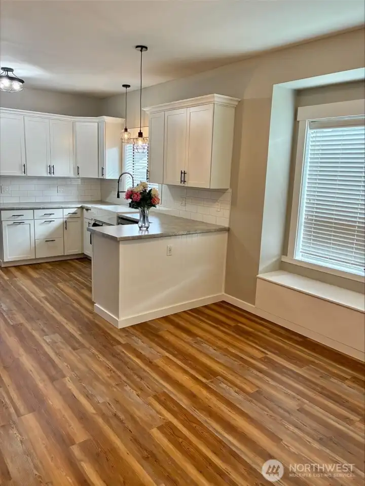 Kitchen and open eating area/window bench