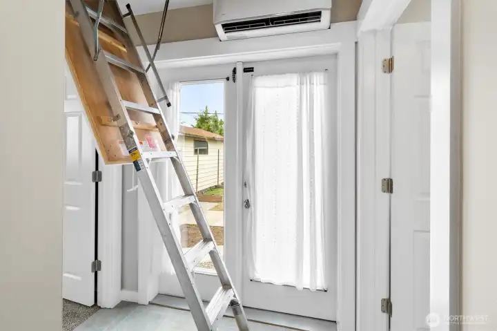 Attic Storage leads to On demand water heater and Storage space spanning across the house
