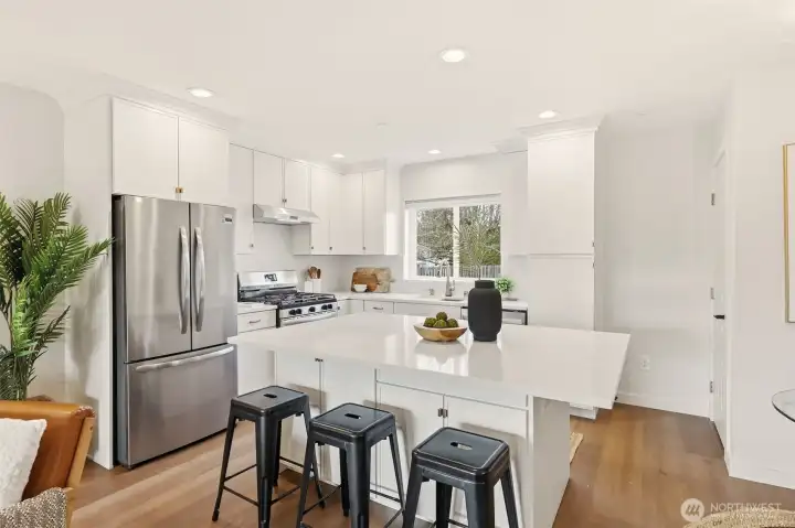 Brand new kitchen... cabinets, countertops, lighting, center island with storage, flooring, and complete new appliance package with warranties.