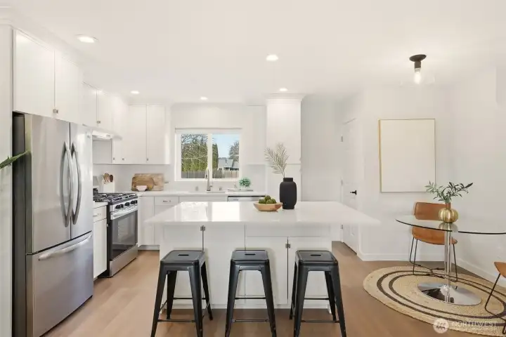 Watch activity in the back yard right from the kitchen window. Or, maybe even the bartender handing out cocktails to the guests on the deck during the summer!