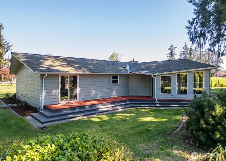Sliders off of the primary bedroom & sunroom open onto the spacious back deck.