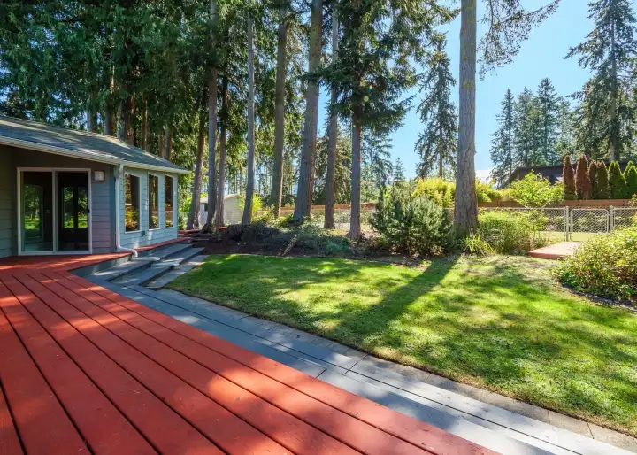 Sider number two lead from the large back deck across the back yard to bridge number two and into the fenced pet area