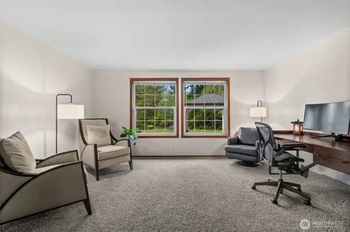Versatility at its finest! This spacious great room offers the perfect footprint for a dedicated home office without sacrificing your main living area—ideal for today’s flexible lifestyle