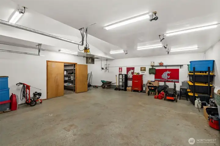 More than just a garage—this is your next big project space. With its generous scale and high-clearance potential, this detached building offers the versatility to adapt to your specific needs and passions. With built in heating as well!