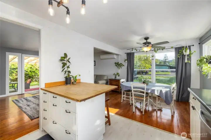 Kitchen connects to the dining room and living room.