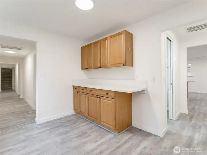 utility area, ample counter space & storage