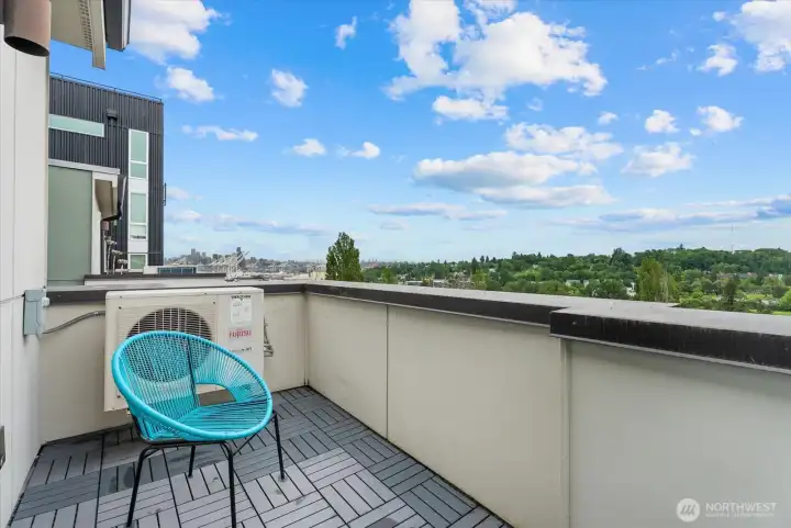 3rd floor bedroom with private access to your open-air deck!