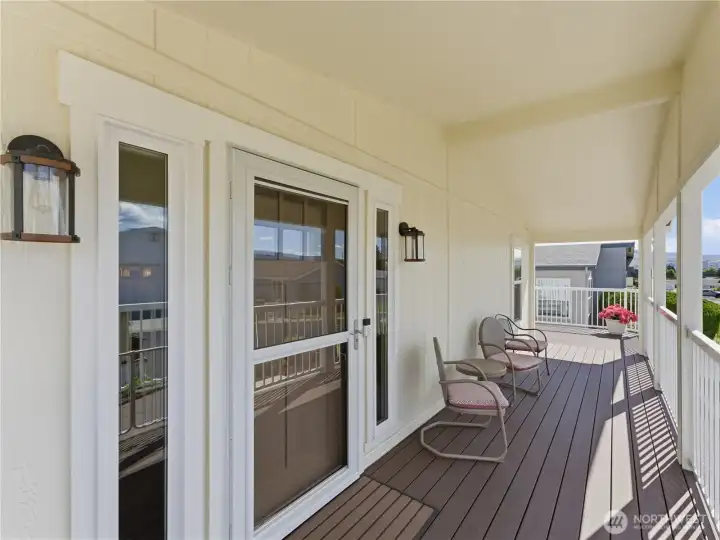 Outdoor living at its finest with upgraded Trex decking and a welcoming front entrance.