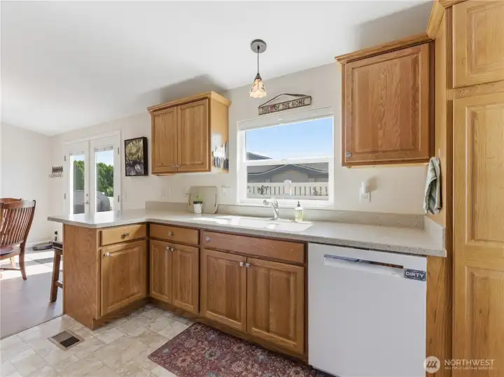 Spacious kitchen with ample counter space, modern appliances, and excellent workflow.