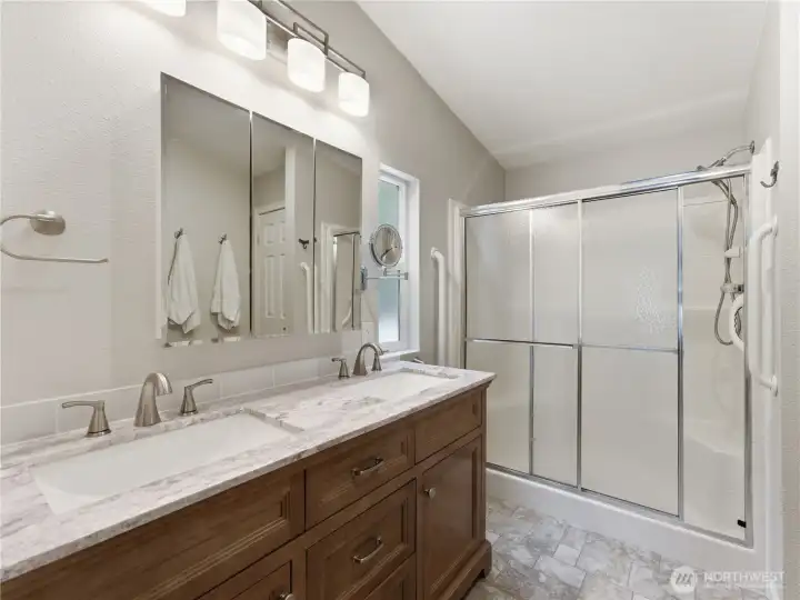 Well-appointed primary bath designed for comfort and convenience.