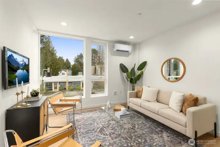 The inviting living area balances sophisticated design with cozy everyday comfort, anchors the home's open floor plan. The inviting living area balances sophisticated design with cozy everyday comfort, anchors the home's open floor plan.