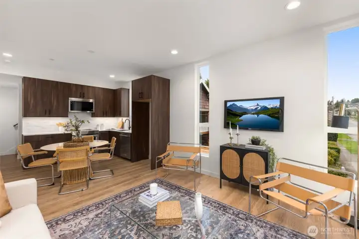 Generous window placement enhances the sense of space, bridging the gap between stylish interiors and the outside world. Generous window placement enhances the sense of space, bridging the gap between stylish interiors and the outside world.
