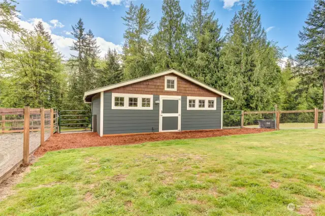 Smaller barn features two run-in stalls with hay storage and locking tack room.