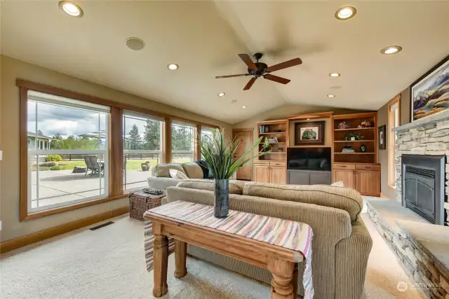 Family room with more windows to the view and patio space