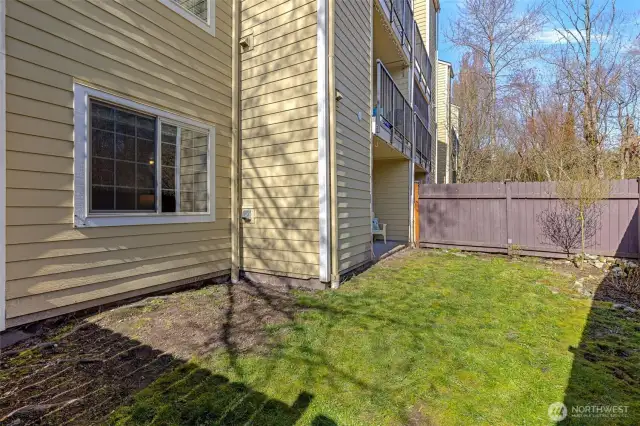 Unit has its own fenced in back yard and patio.