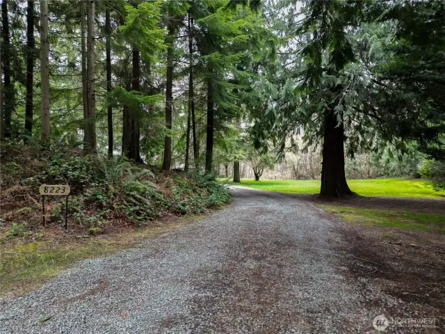Private setting with circular driveway & plenty of parking.