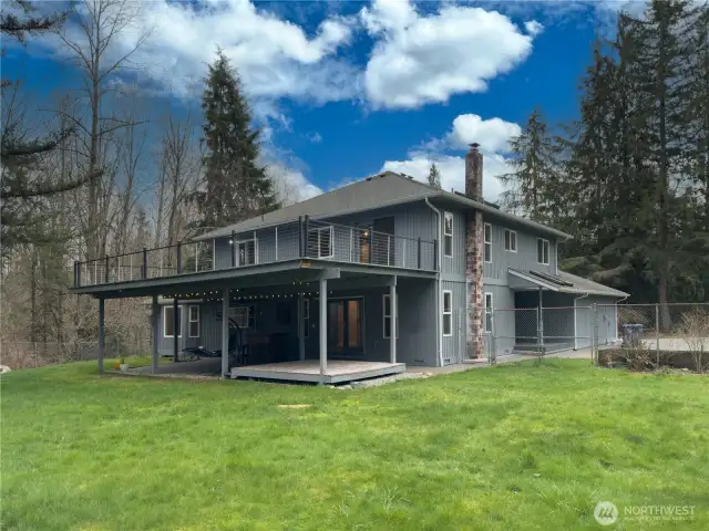 Full fenced, very private backyard. Upper deck is sealed so the lower level stays dry for year round use of  entertaining, BBQ'ing or relaxing.