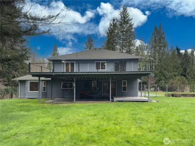 Full fenced, very private backyard. Upper deck is sealed so the lower level stays dry for year round use of entertaining BBQ'ing, or relaxing.