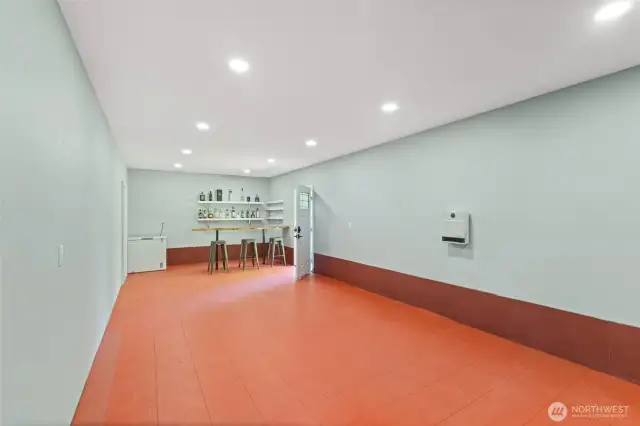 Basement with additional storage and bar area in rear