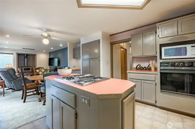 Kitchen features an island and pantry