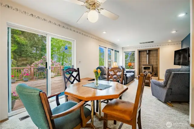 Breakfast nook and family room with deck access