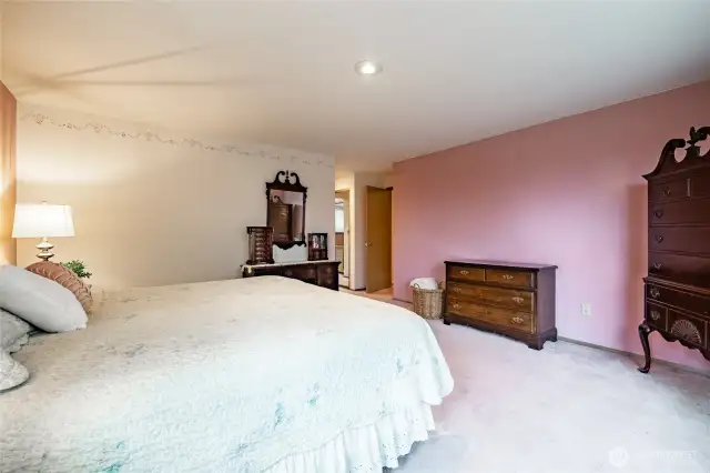 Primary Bedroom with Ensuite and views of the Canadian mountains and a peek-a-boo view of Bellingham Bay