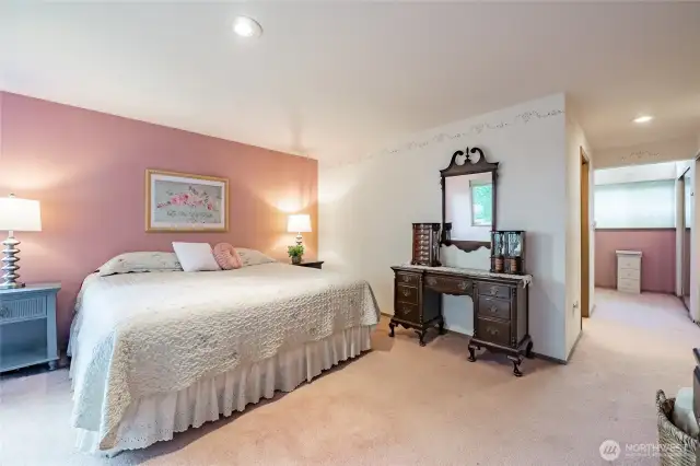 Primary Bedroom with Ensuite and views of the Canadian mountains and a peek-a-boo view of Bellingham Bay