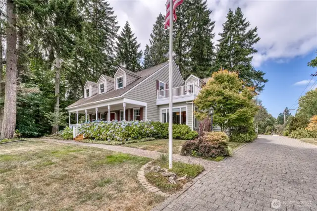 Side view showcasing upper decks on each end of the home. Large main deck extends the entire length of the home.  Perfect for entertaining and enjoying the City, Sound, Kingston Harbor, Mountain views.