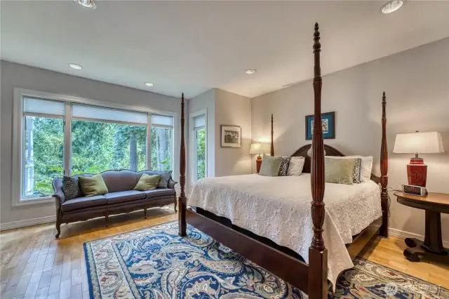 Additional primary ensuite on Main floor with full bath, walk-in closet and office space.