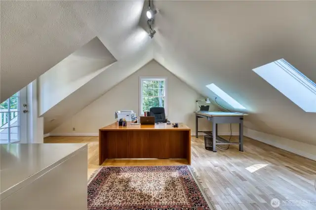 Primary Level 2 Den/Office with deck access.