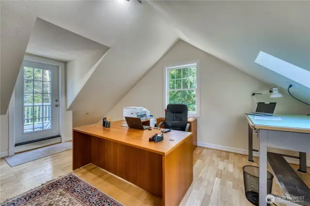 Primary Level 2 den/office with view and access to deck. Note - there are 2 roof decks on Level 2 on each side of the home.