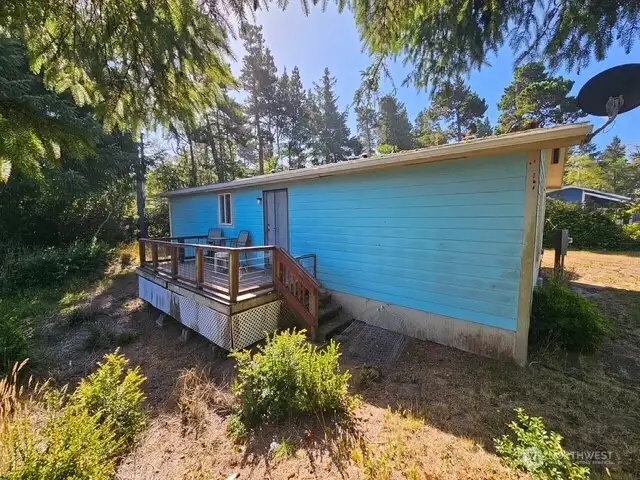 Back deck with gate to let your pets enjoy the outside air.