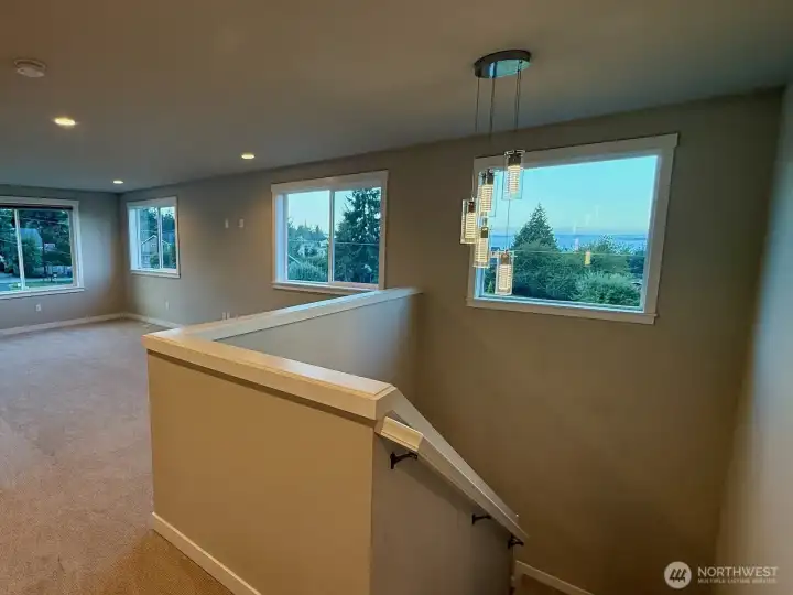 West-facing views of Puget Sound and Olympic Mountains, perfect for sunsets.