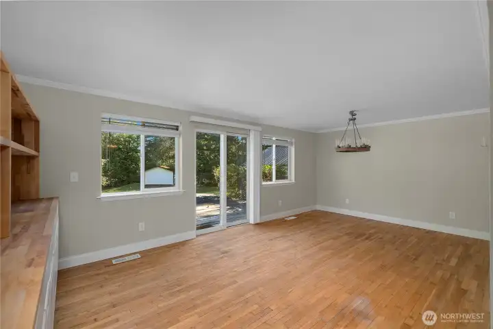 The wood floors continue into the Family Room.