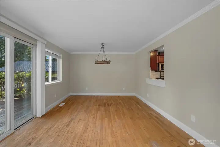 The FR has a slider that opens to a huge back deck for entertaining.