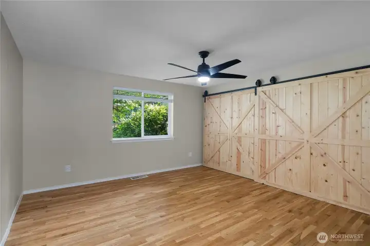The very spacious primary BR has a closet that is the whole end of the room!