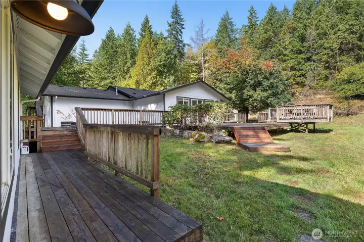 View from 1st Garage/Workshop to deck and house.