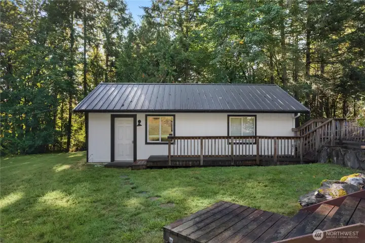 The garage is the right half, and the workshop is the left half.