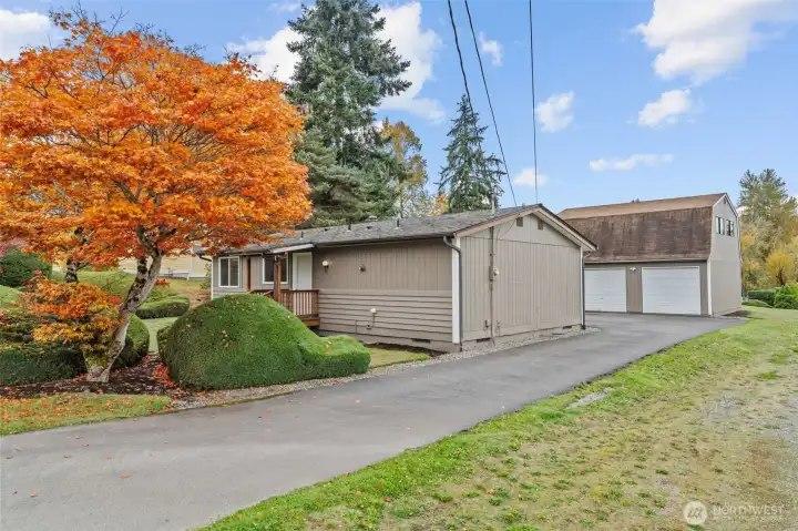 Showing Driveway to plenty of off-street parking in back of home