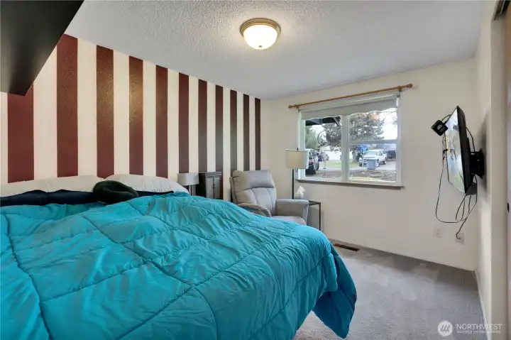 Bedroom #2. The window has a view of the front yard.