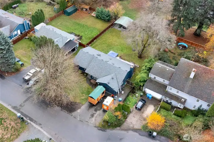 Sky view: front of the home with tree coverage for shade (and great for energy saving purposes year round).