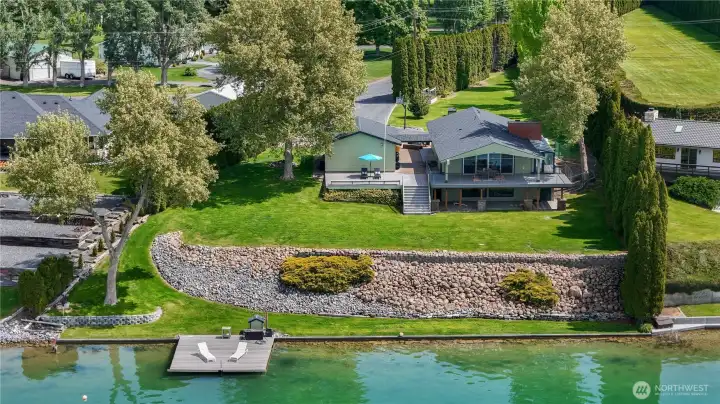 Private waterfront retreat on nearly an acre in sought-after Cascade Valley