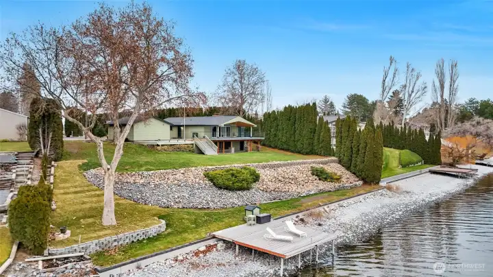 Expansive waterfront setting with approximately 145 feet of frontage