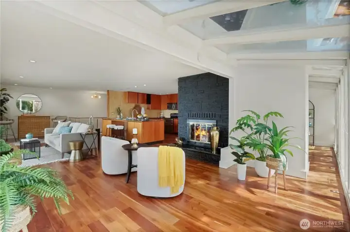 Stunning real hardwood floors and rich cherry wood trim throughout
