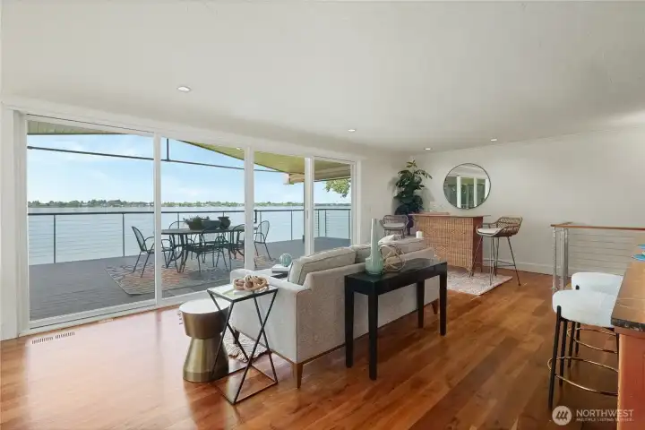 Large picture windows frame breathtaking lake views