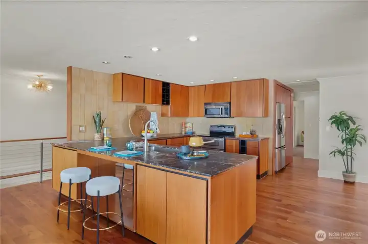 Open layout connects kitchen, dining, and living areas