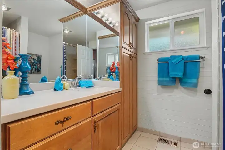 Updated bathrooms with clean finishes and practical design