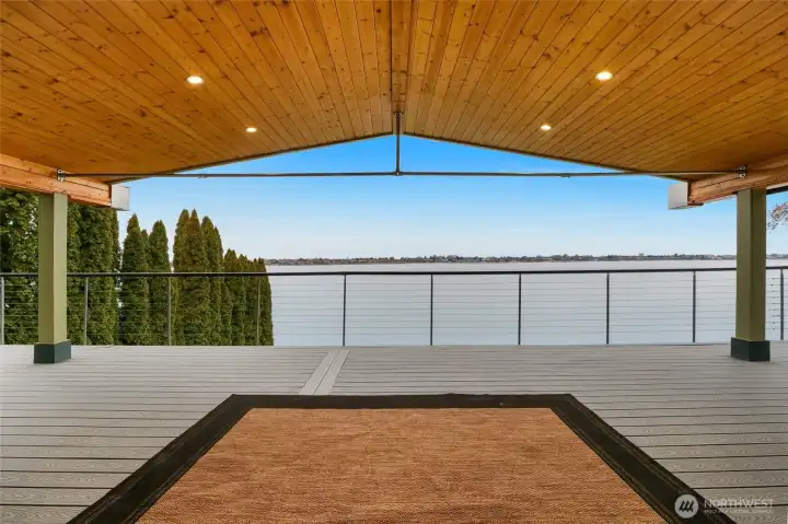 Stunning 16-foot double slider opening directly to the lake