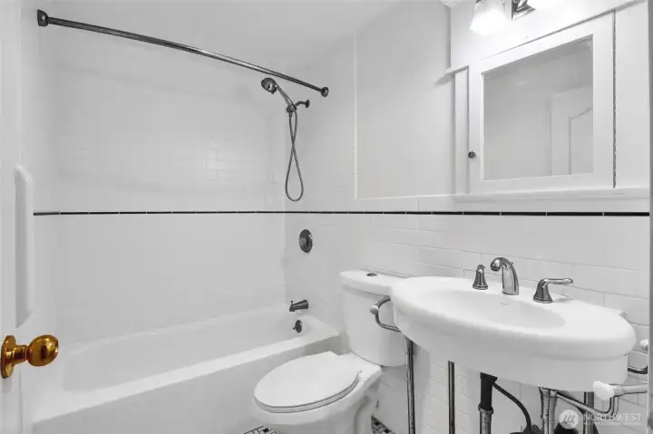 Well-appointed lower-level bath serving the basement living space