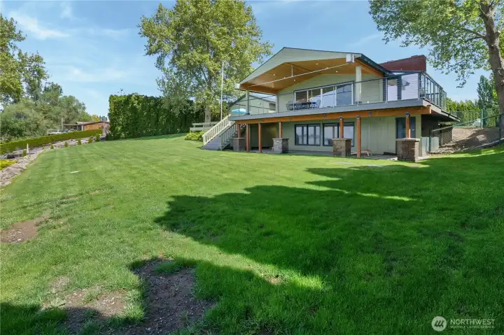 Expansive lot with room for entertaining, recreation, and future potential